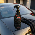 Shampoing sans eau EXAGONE N°1 présenté sur carrosserie automobile avec microfibre pour nettoyage sans rinçage